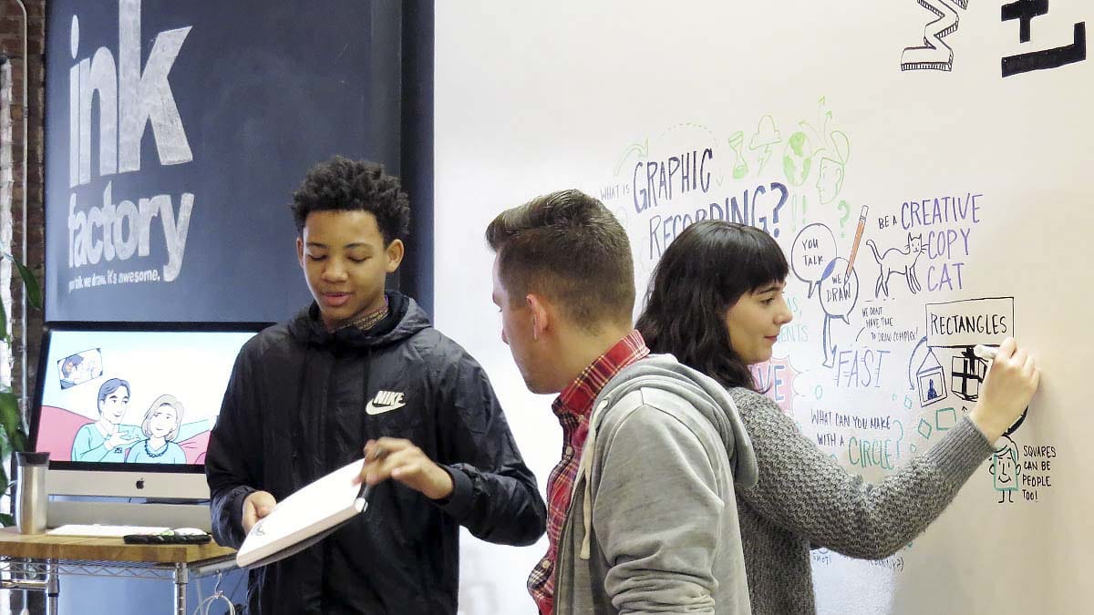 An EMBARC student shares his visual notes with the group
