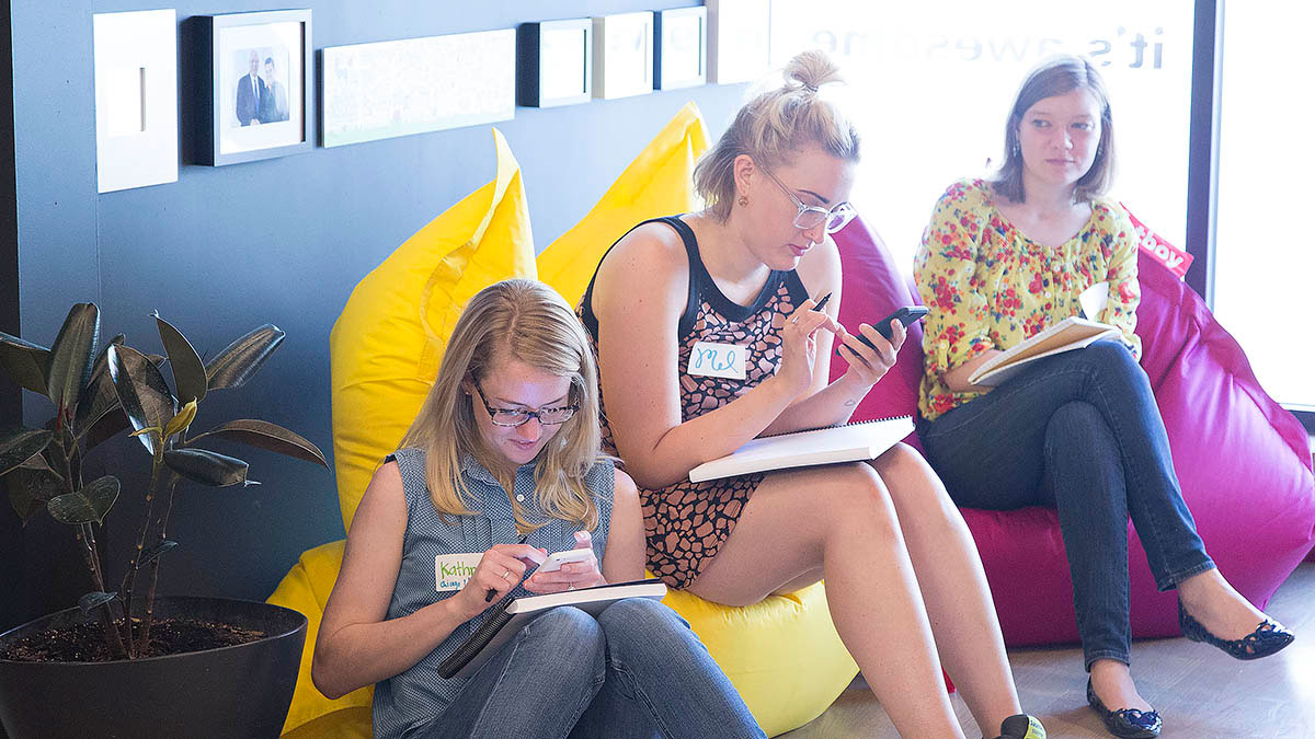 Co-op members draw in their sketchbooks during the workshops